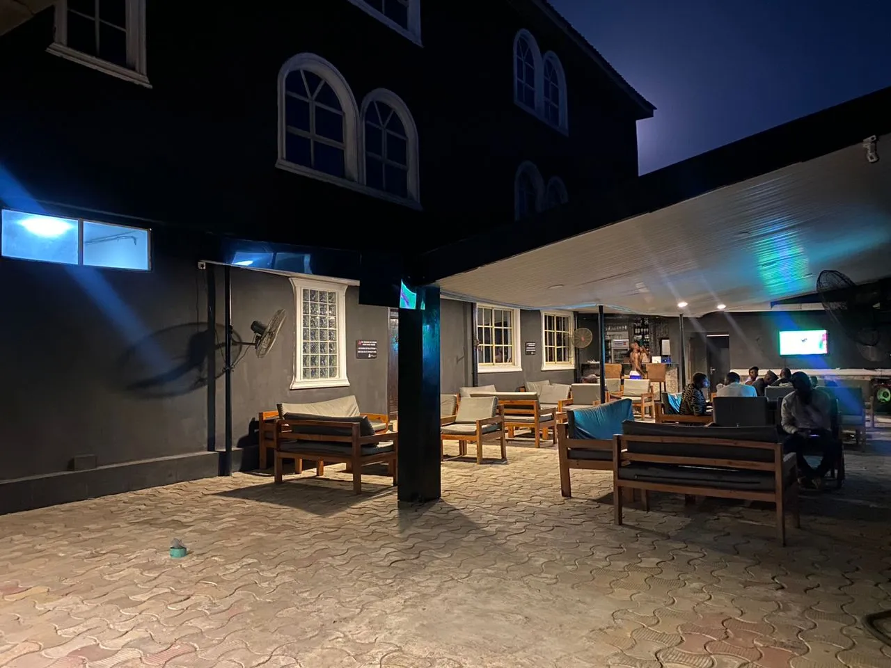 Dimple 44 outdoor courtyard at night