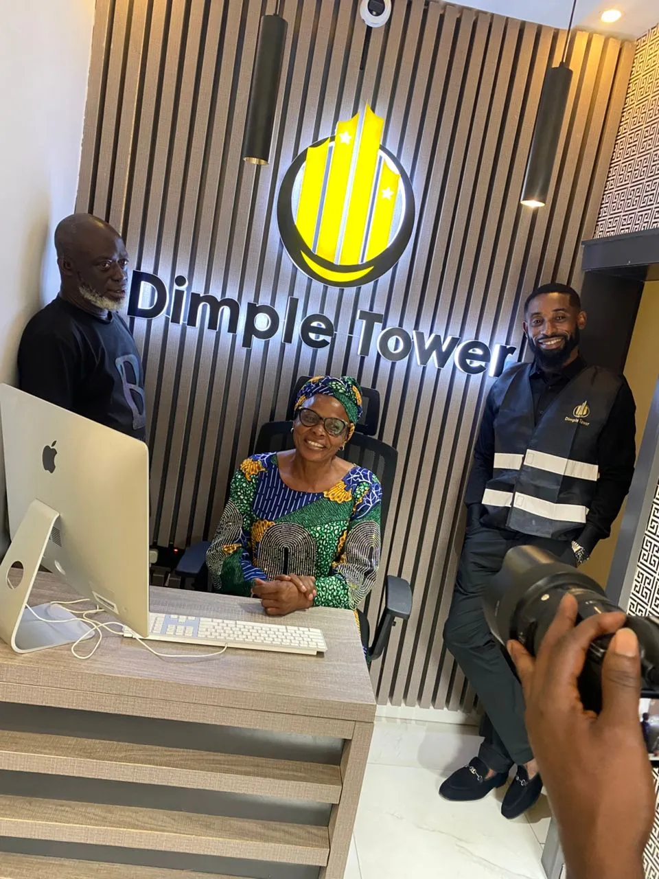 Front-desk team welcoming guests at the Dimple Tower reception